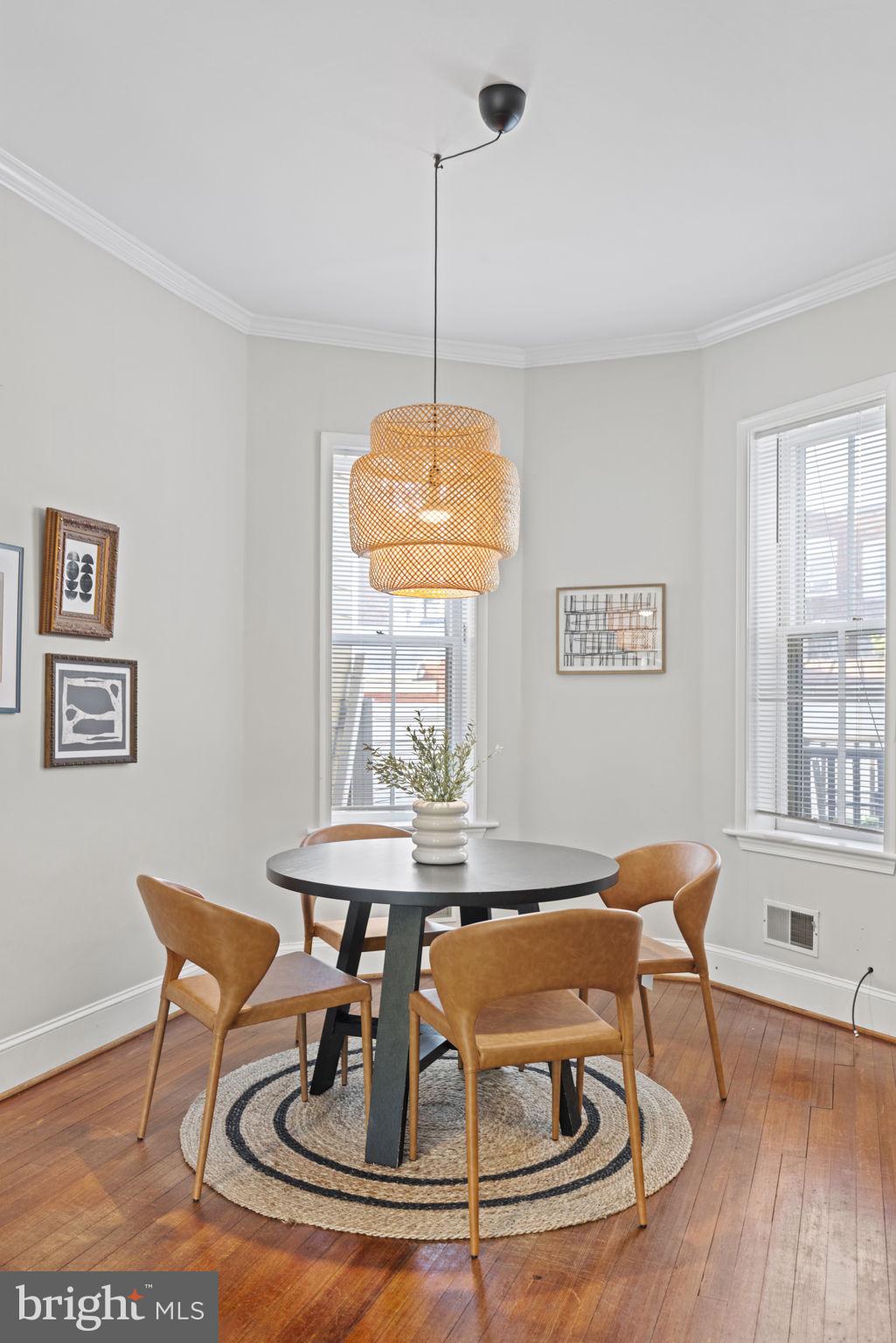 115 R Street Northwest Washington, DC 20001 - Photo 12 of 48 a view of a dining room with furniture window and wooden floor