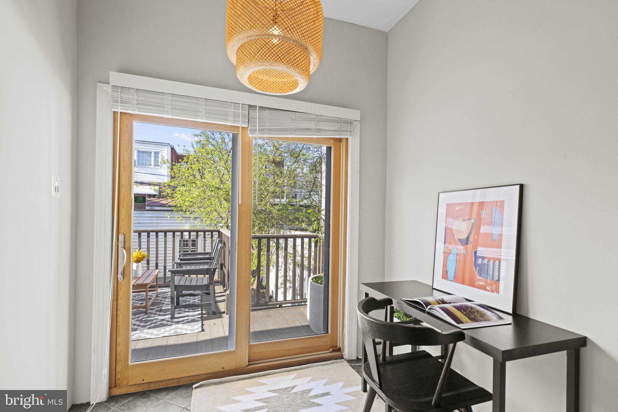 115 R Street Northwest Washington, DC 20001 - Photo 21 of 48 a view of a livingroom with furniture and wooden floor