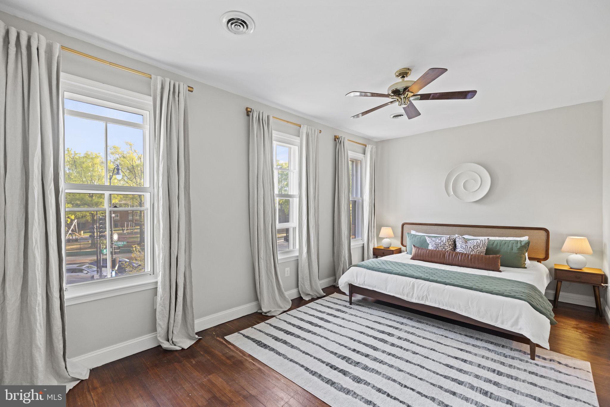 115 R Street Northwest Washington, DC 20001 - Photo 24 of 48 a bedroom with a bed and a window