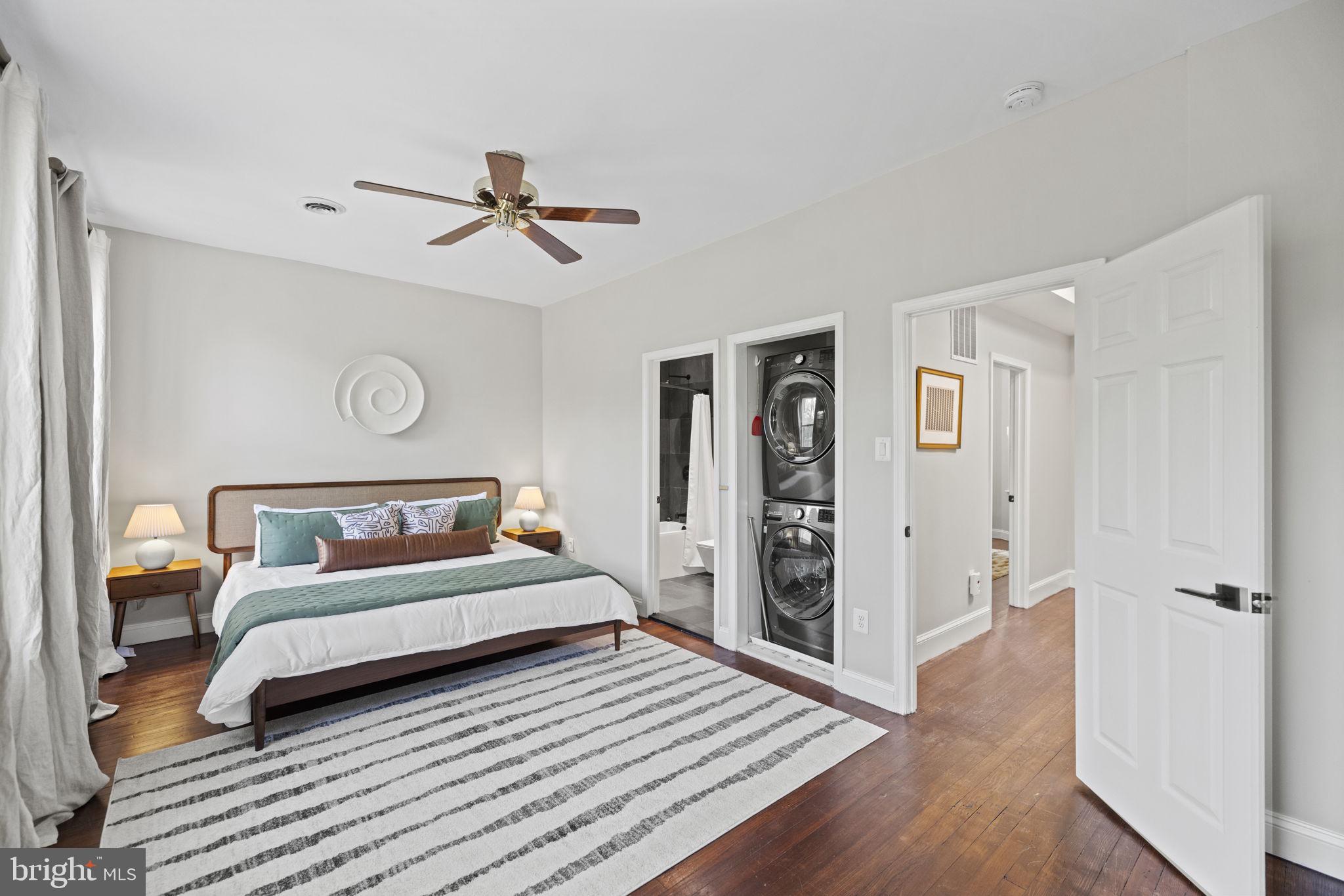 115 R Street Northwest Washington, DC 20001 - Photo 25 of 48 a bedroom with a bed and wooden floor