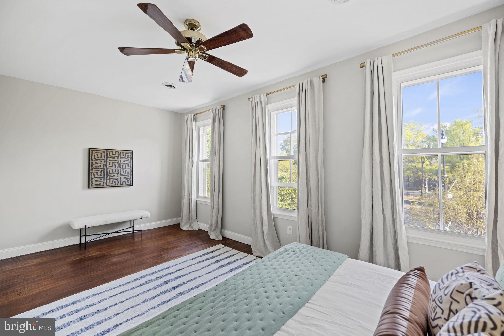 115 R Street Northwest Washington, DC 20001 - Photo 26 of 48 a bedroom with a bed and a window