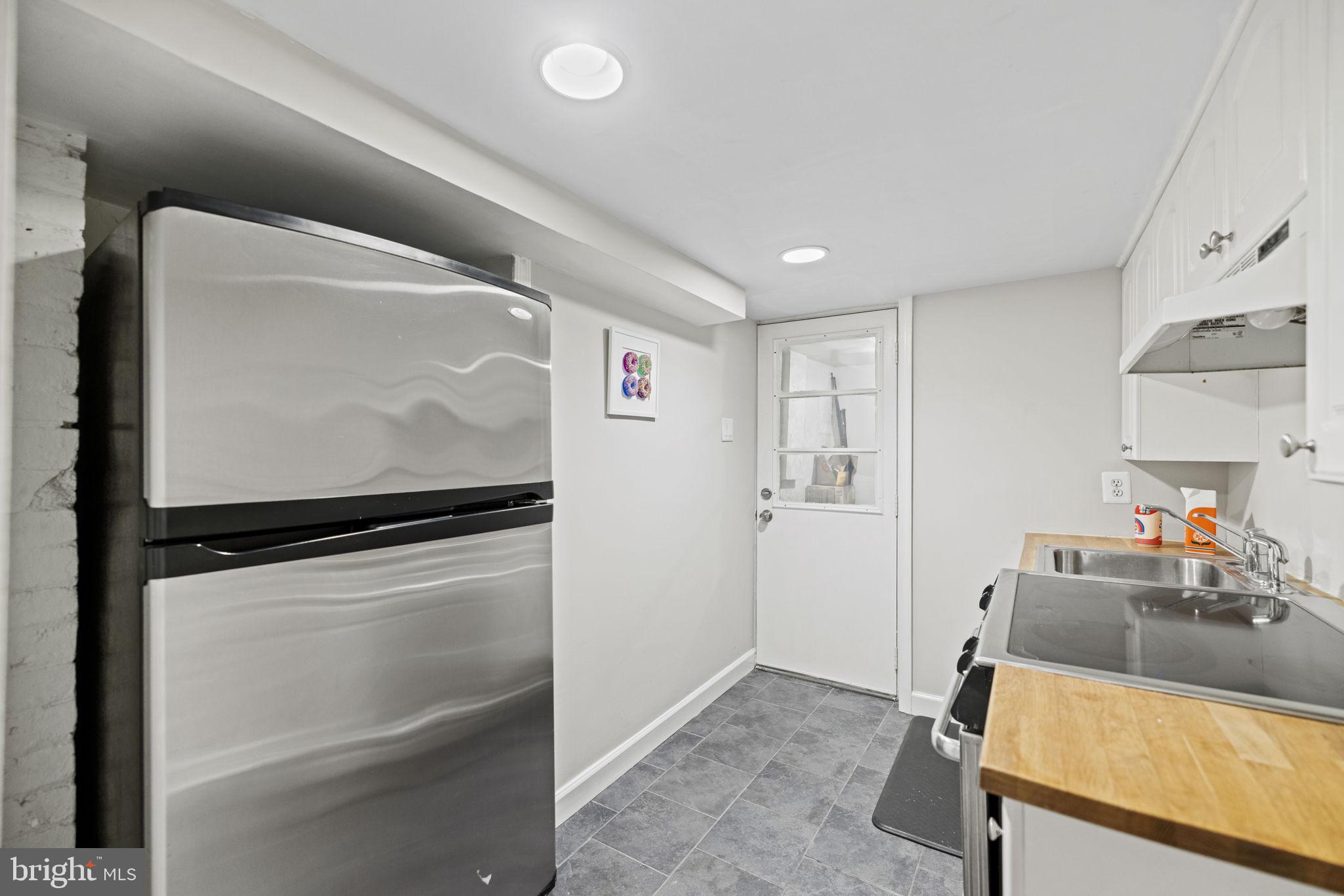 115 R Street Northwest Washington, DC 20001 - Photo 38 of 48 a room with storage and utility