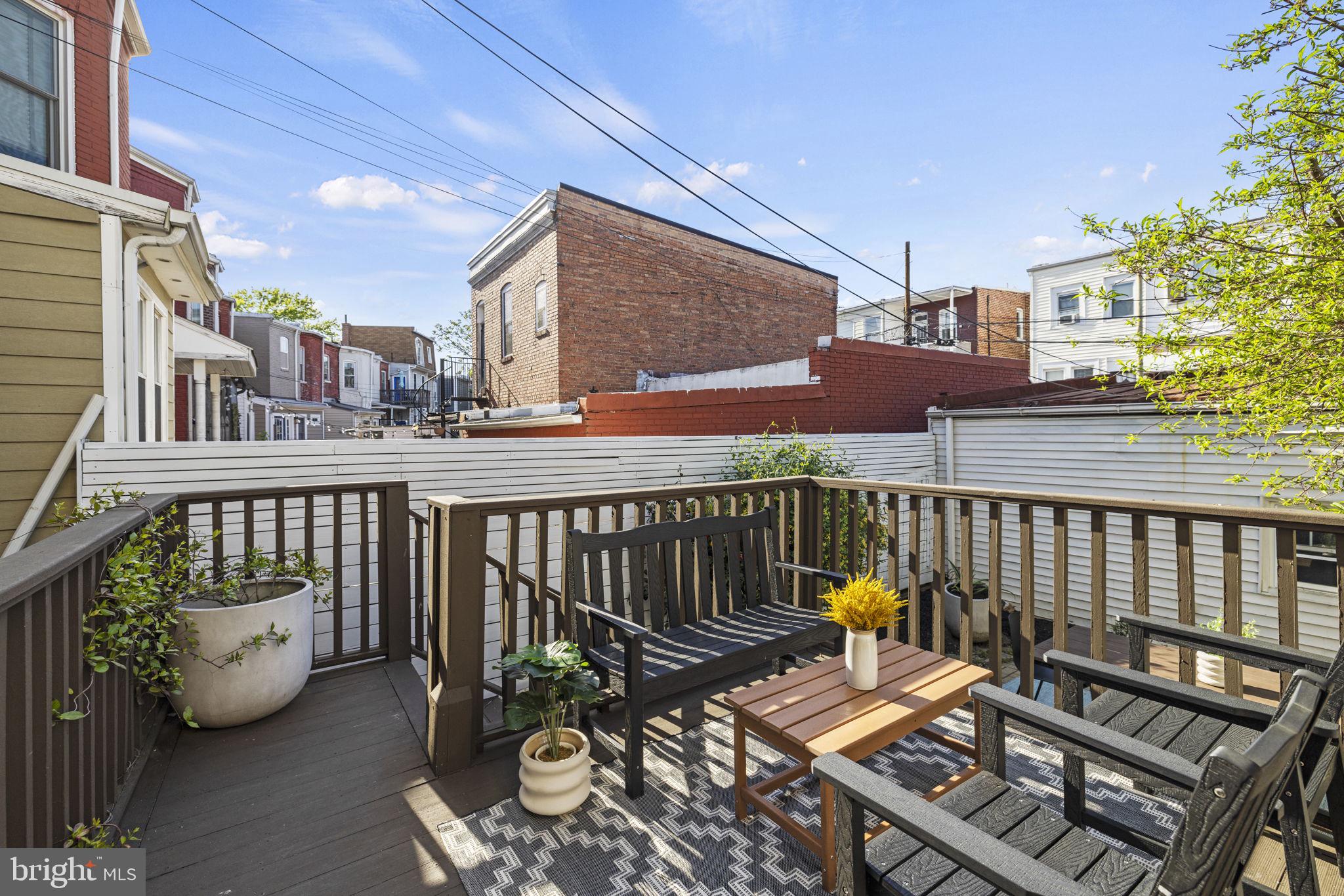 115 R Street Northwest Washington, DC 20001 - Photo 41 of 48 a view of a patio with wooden floor