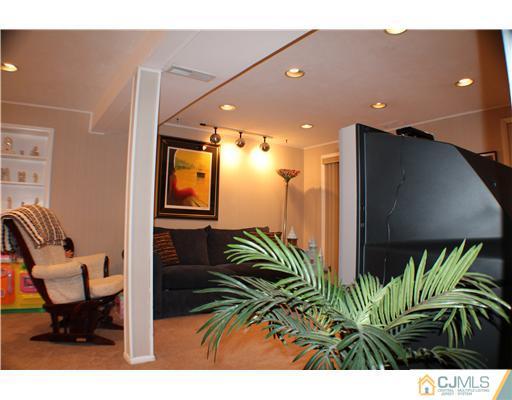 39 Gramercy Road Old Bridge, NJ 08857 - Photo 14 of 20 a balcony with table and chairs