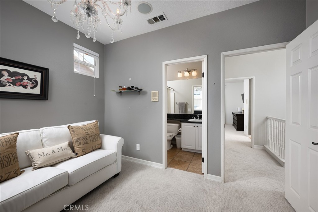 41 Ethereal Ladera Ranch, CA 92694 - Photo 22 of 35 a living room with furniture and a chandelier