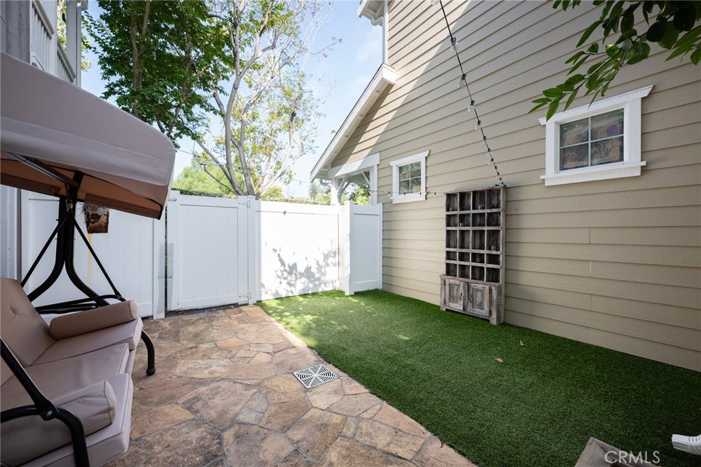 41 Ethereal Ladera Ranch, CA 92694 - Photo 26 of 35 a view of a backyard with wooden fence and a large tree