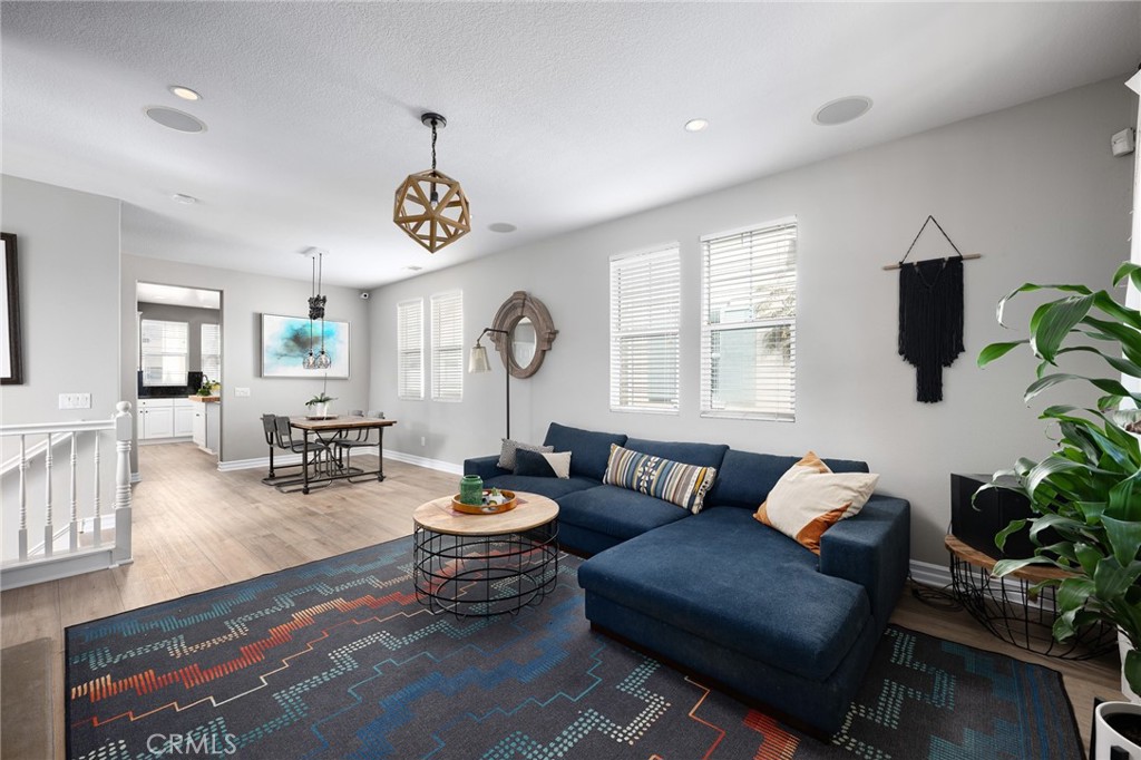 41 Ethereal Ladera Ranch, CA 92694 - Photo 7 of 35 a living room with furniture potted plant and a window