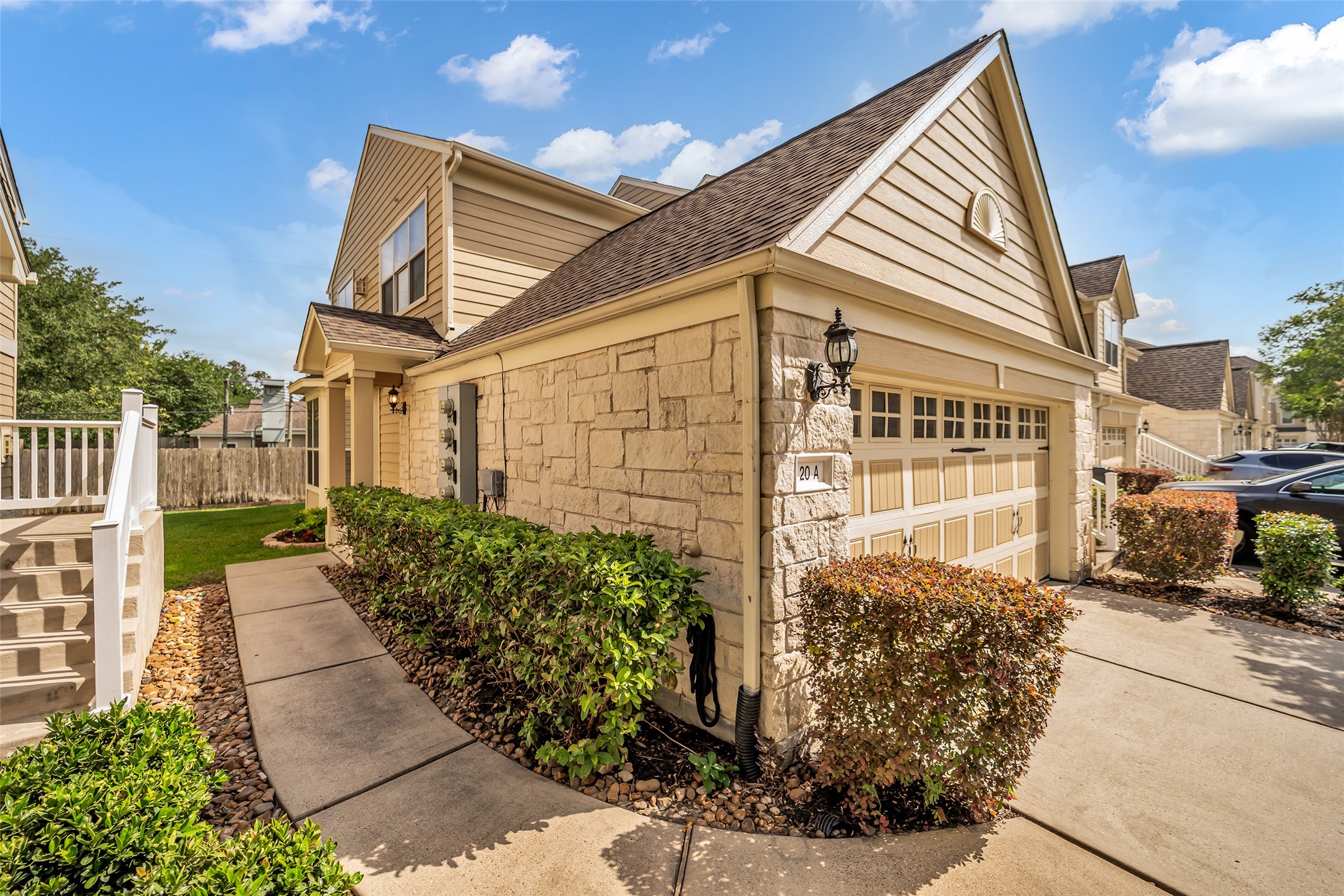 13600 Breton Ridge Street, Unit 20A Houston, TX 77070 - Photo 3 of 25 Beautiful stone on exterior