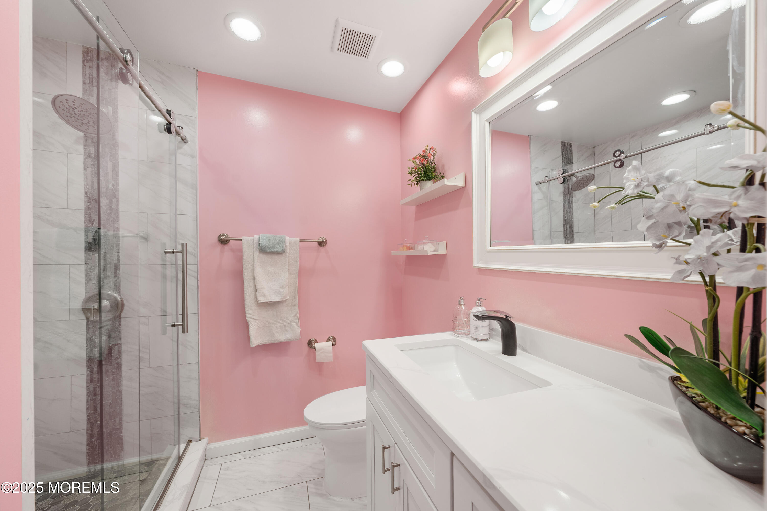 436 Applegate Avenue Toms River, NJ 08757 - Photo 12 of 27 a bathroom with a sink a toilet and shower