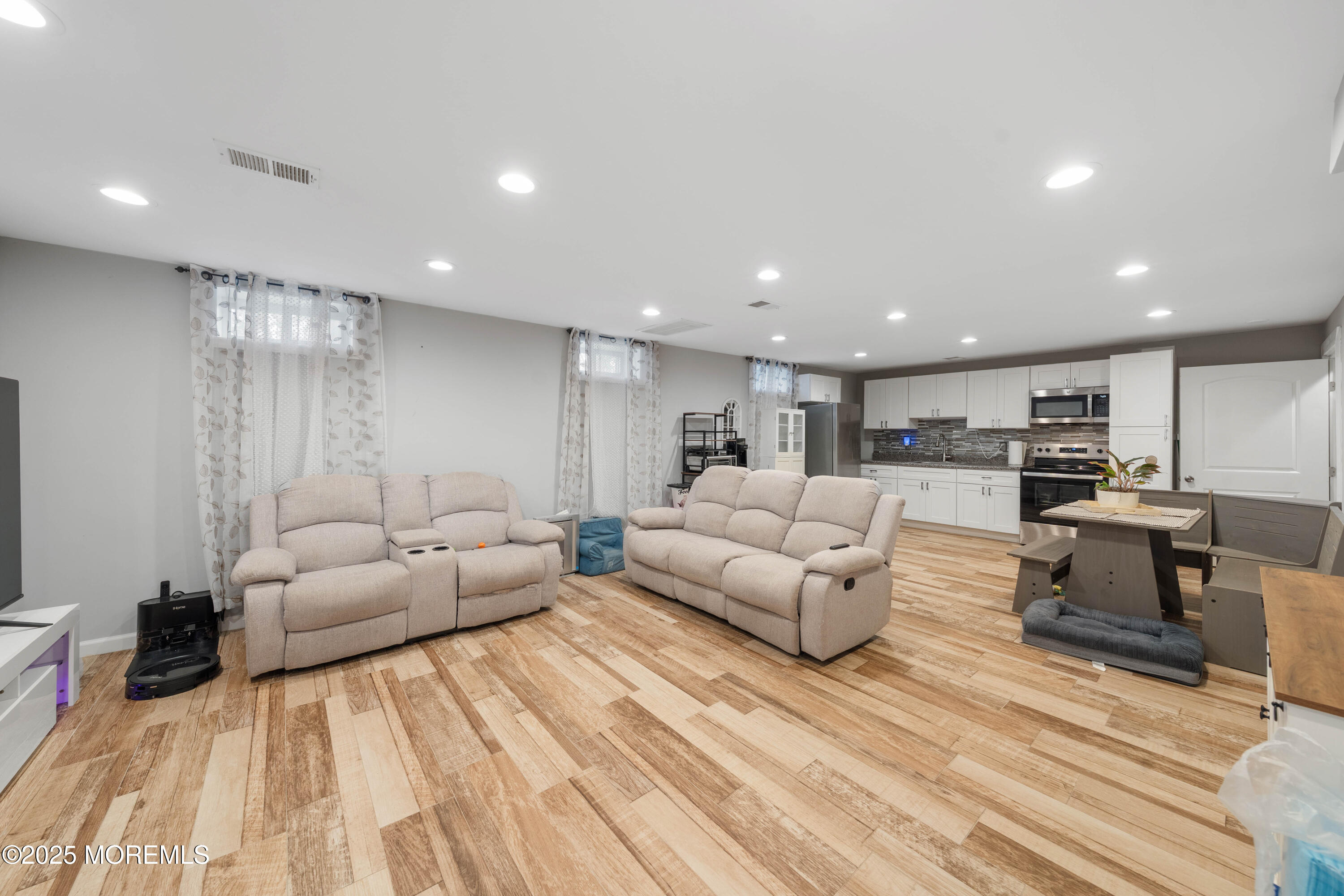 436 Applegate Avenue Toms River, NJ 08757 - Photo 13 of 27 a living room with furniture and view of kitchen