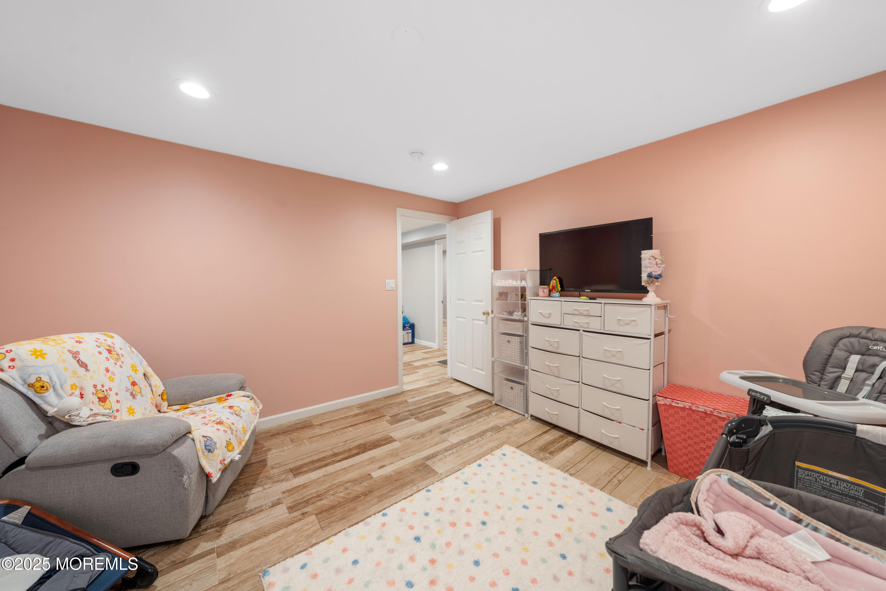 436 Applegate Avenue Toms River, NJ 08757 - Photo 18 of 27 a living room with furniture and a flat screen tv