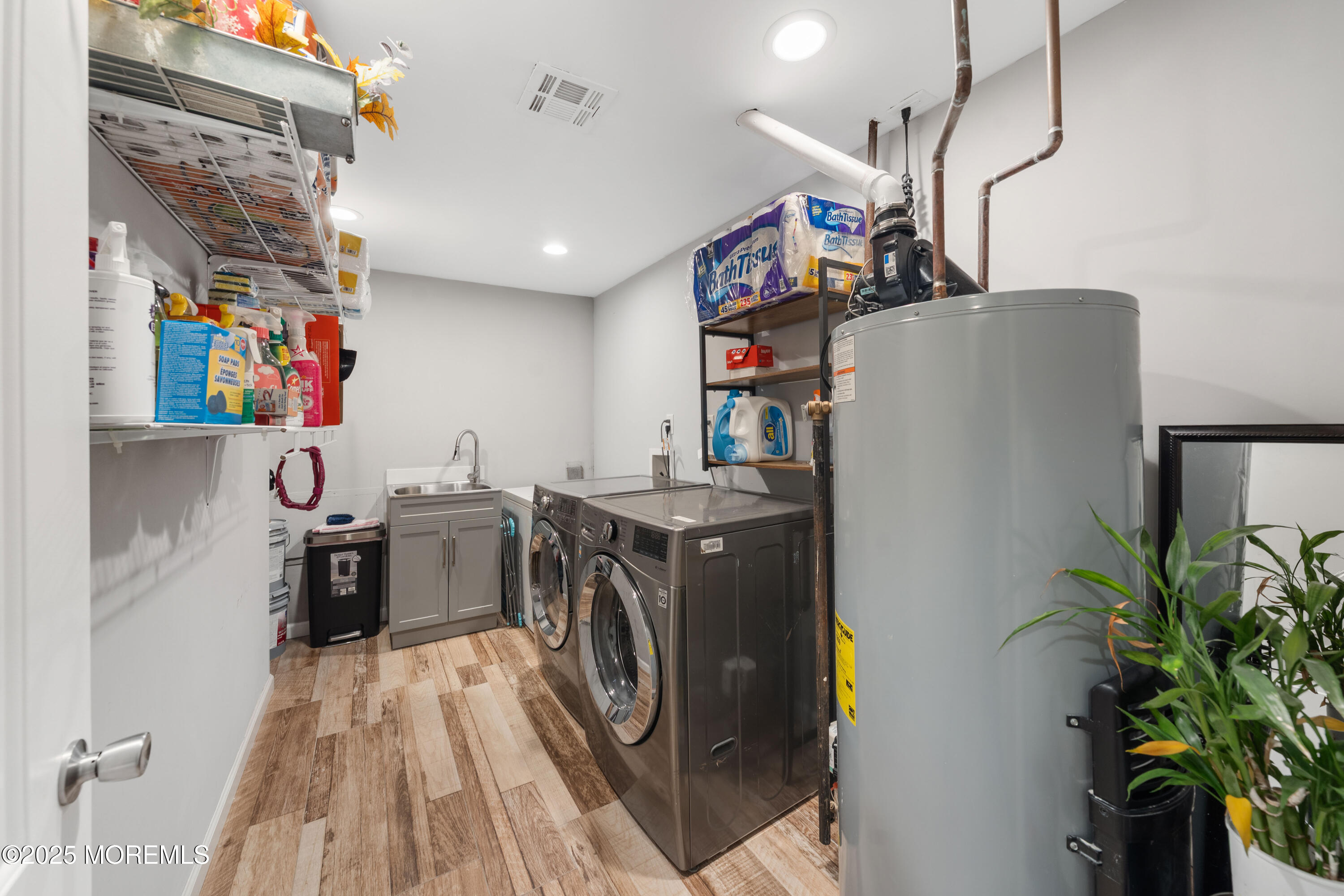 436 Applegate Avenue Toms River, NJ 08757 - Photo 20 of 27 a storage room with cabinets
