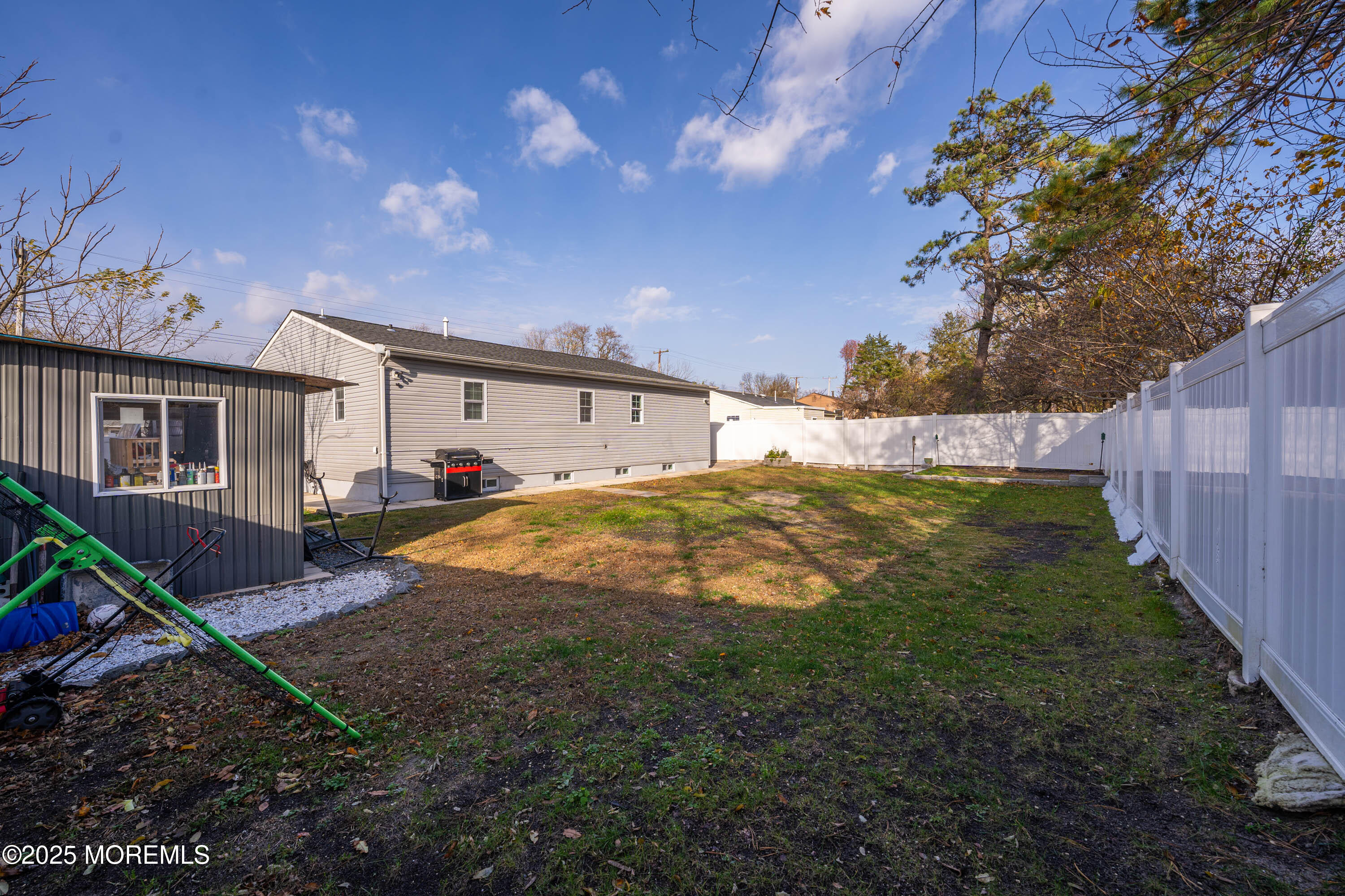 436 Applegate Avenue Toms River, NJ 08757 - Photo 23 of 27 a swimming pool with outdoor seating and yard