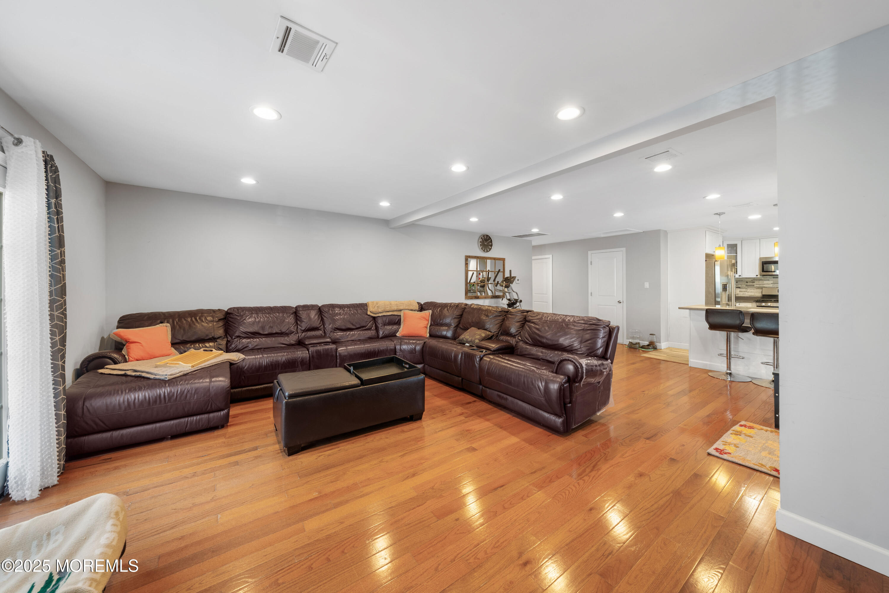 436 Applegate Avenue Toms River, NJ 08757 - Photo 5 of 27 a living room with furniture and a couch