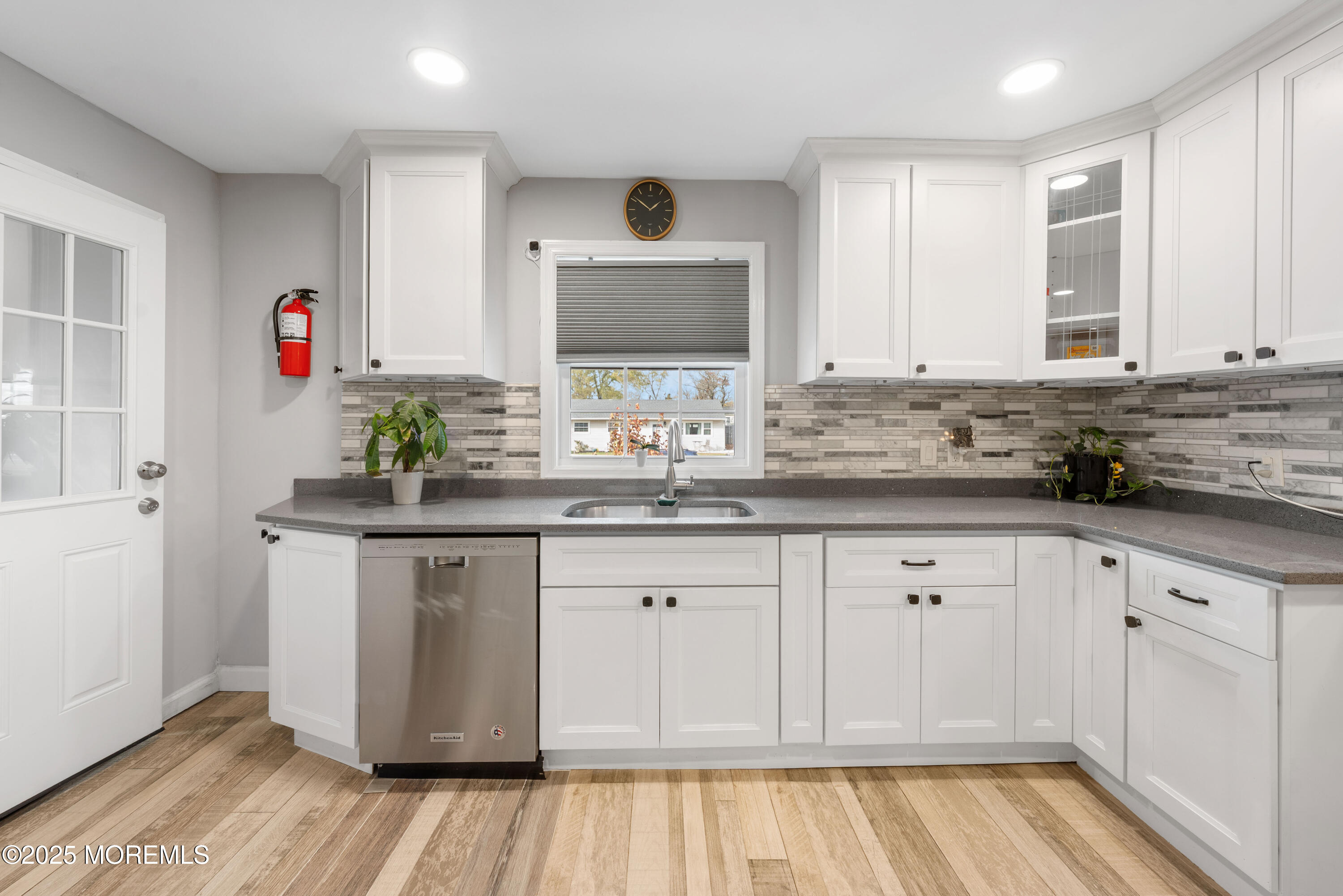 436 Applegate Avenue Toms River, NJ 08757 - Photo 6 of 27 a kitchen with stainless steel appliances granite countertop a sink and cabinets