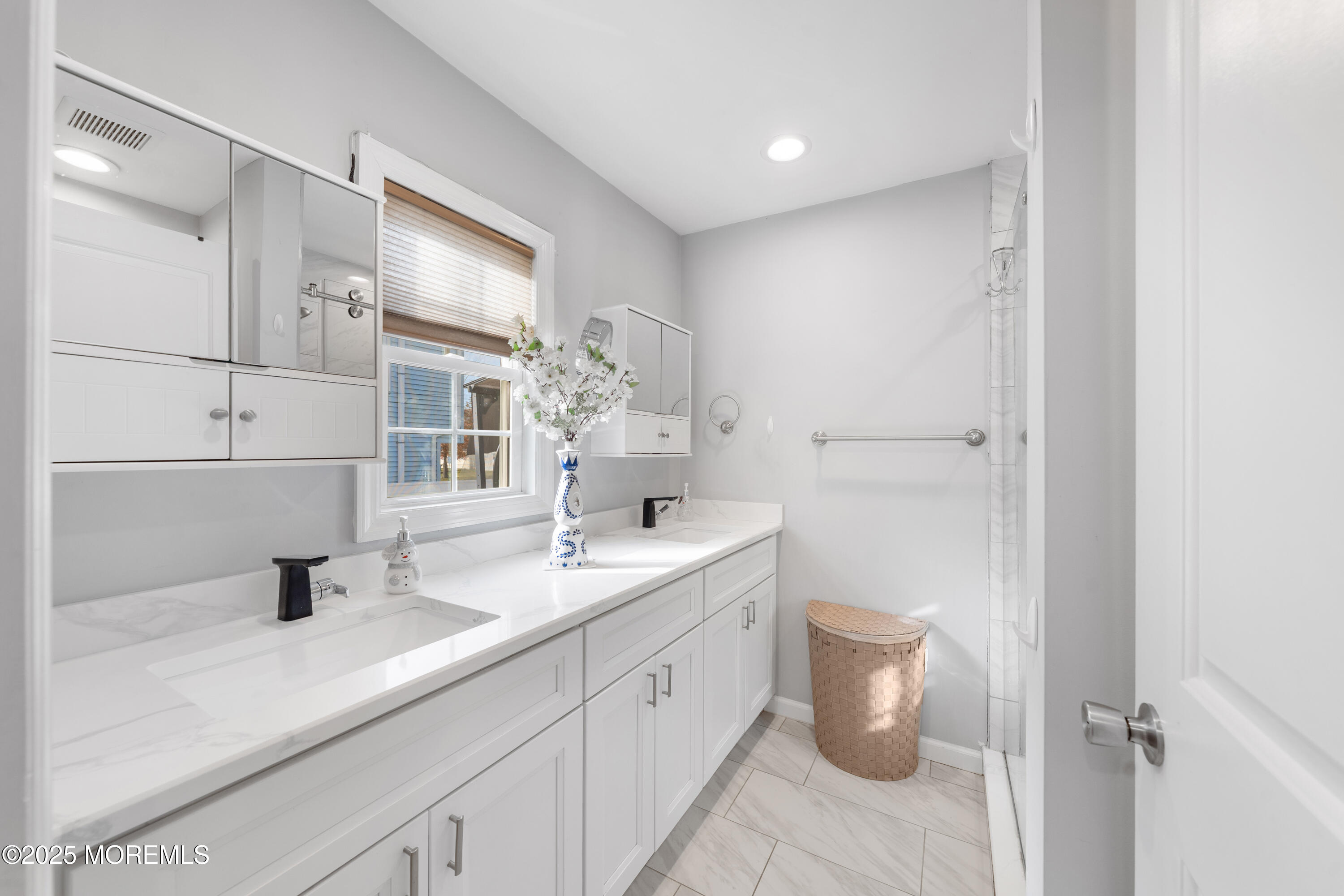 436 Applegate Avenue Toms River, NJ 08757 - Photo 9 of 27 a spacious bathroom with a double vanity sink mirror and toilet