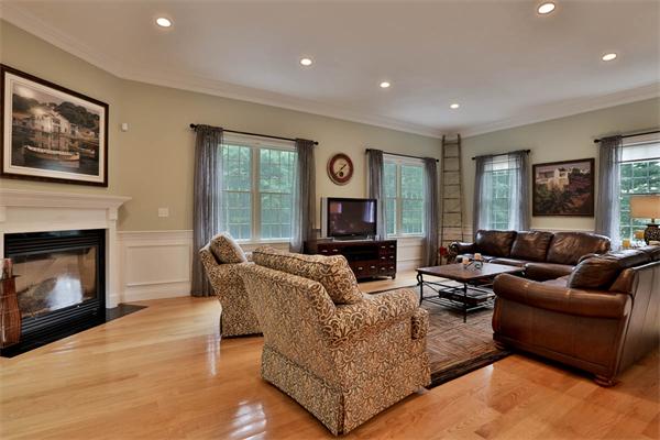 5 Snowcrest Run North Reading, MA 01864 - Photo 11 of 30 a living room with furniture window and a fireplace