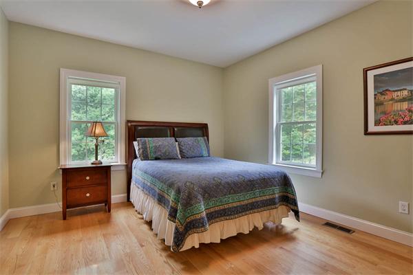 5 Snowcrest Run North Reading, MA 01864 - Photo 15 of 30 a bed sitting in a bedroom next to a window