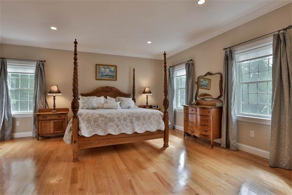 5 Snowcrest Run North Reading, MA 01864 - Photo 19 of 30 a bedroom with a bed and wooden floor