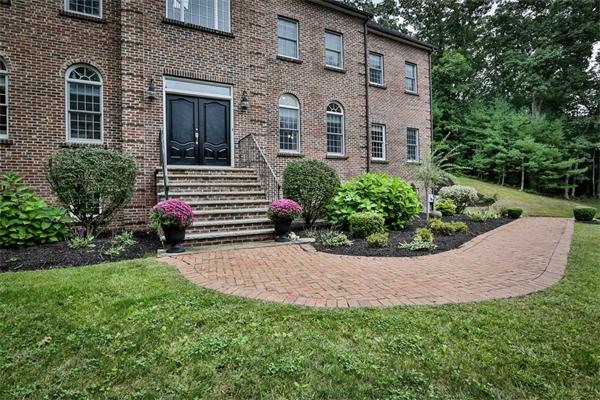 5 Snowcrest Run North Reading, MA 01864 - Photo 2 of 30 a front view of a house with a yard