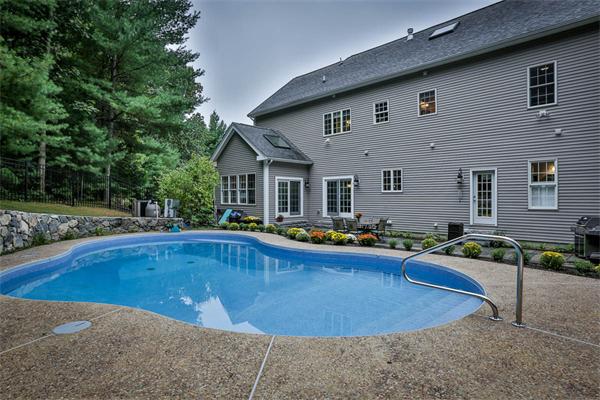 5 Snowcrest Run North Reading, MA 01864 - Photo 28 of 30 a front view of house with yard and outdoor seating
