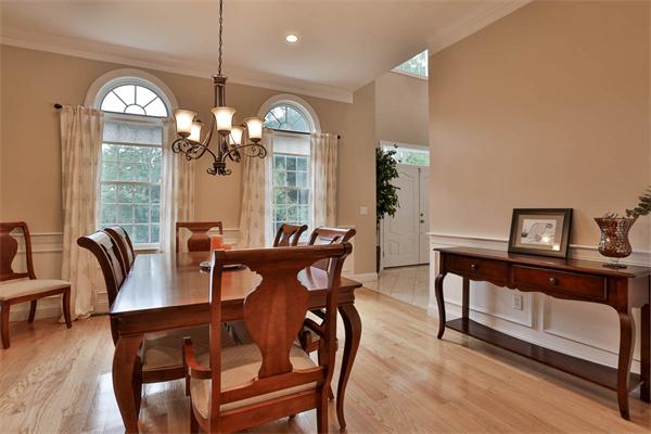 5 Snowcrest Run North Reading, MA 01864 - Photo 7 of 30 a view of a dining room with furniture and chandelier