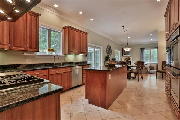 5 Snowcrest Run North Reading, MA 01864 - Photo 9 of 30 a kitchen with stainless steel appliances granite countertop a stove a sink a oven and a refrigerator