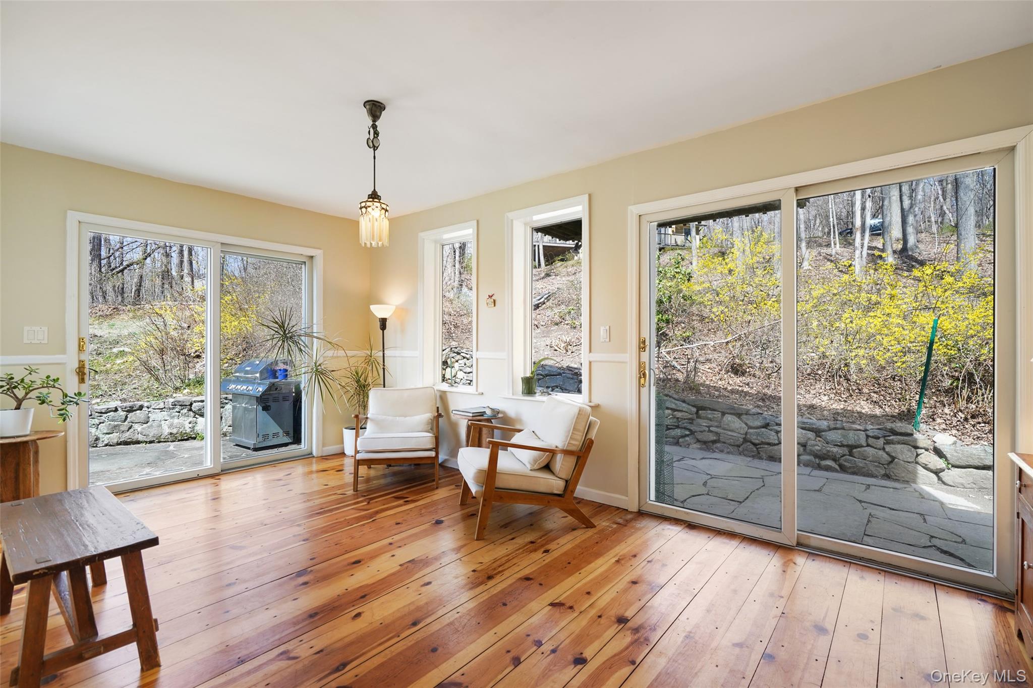 101 Hustis Road Cold Spring, NY 10516 - Photo 17 of 40 Relaxing sunroom with beautiful views and gorgeous wide plank floors