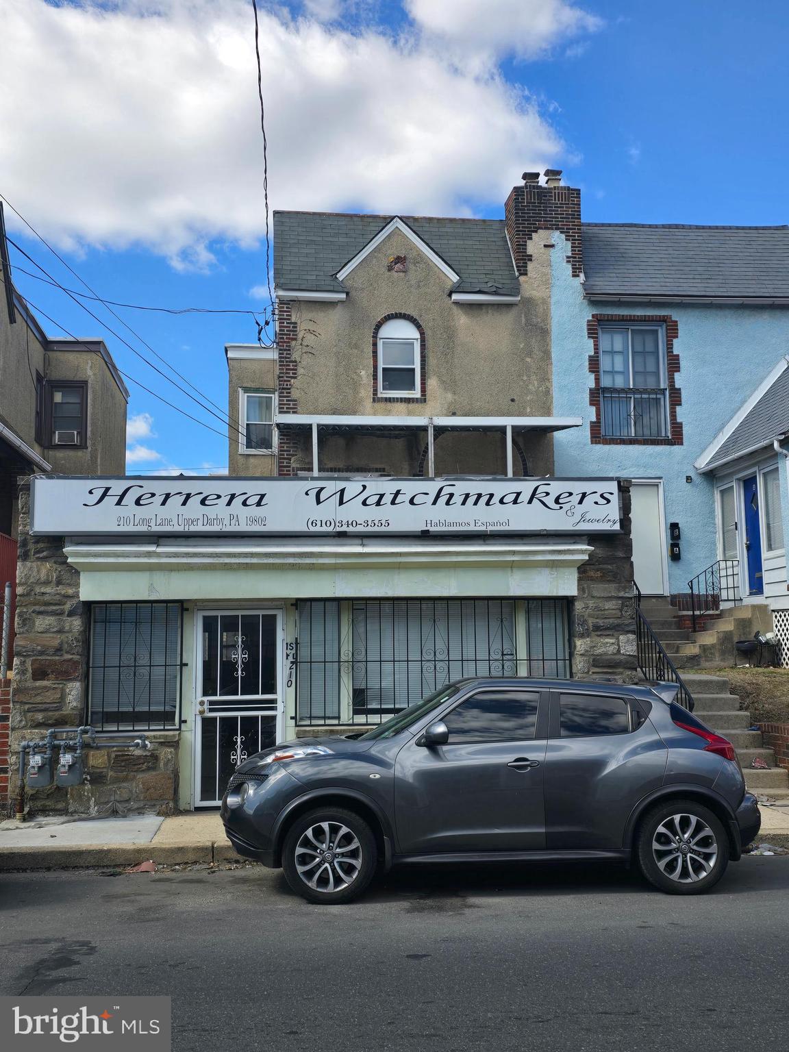 210 Long Lane Upper Darby, PA 19082 - Photo 1 of 21 a front view of a building with parking space