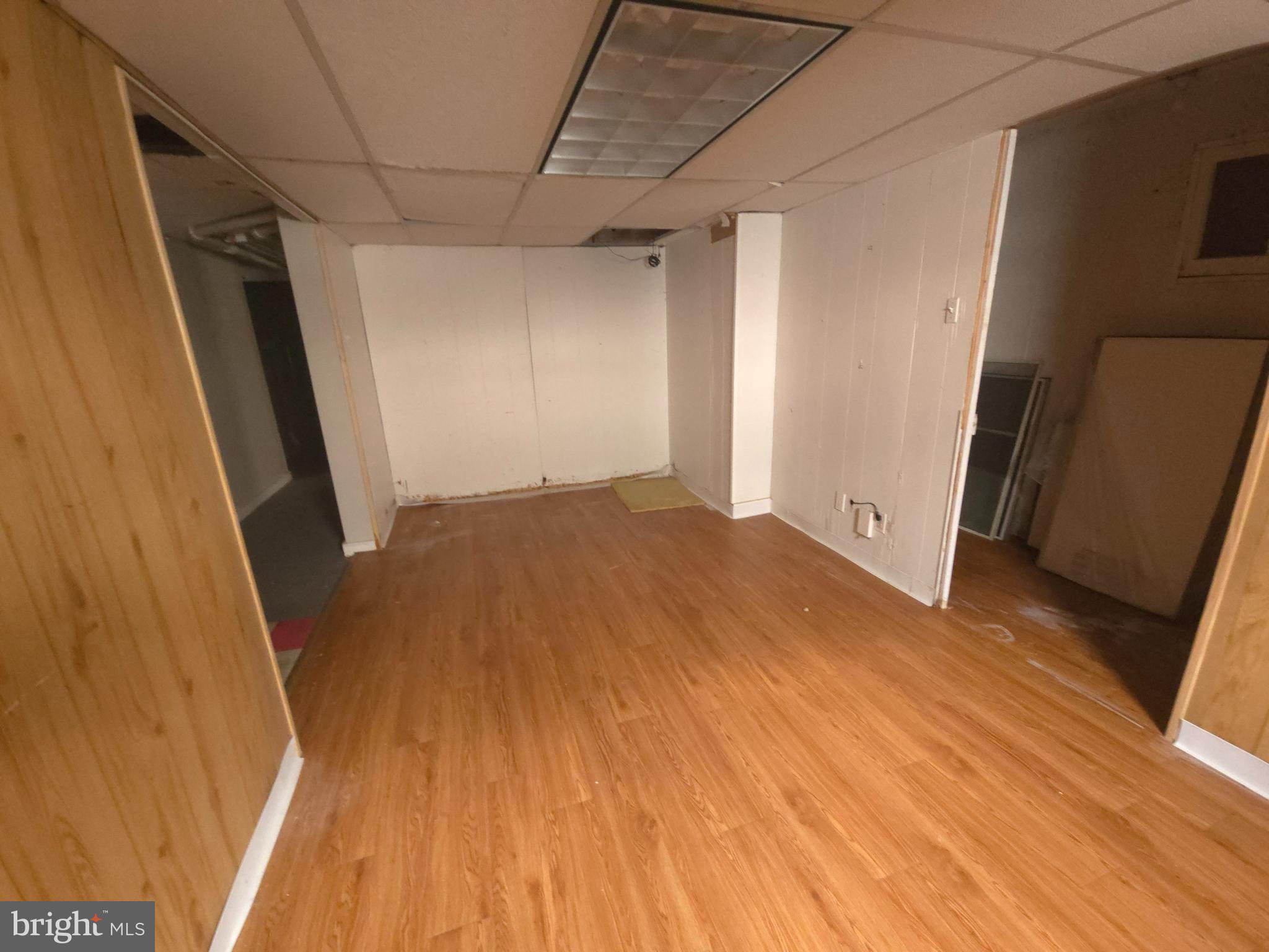210 Long Lane Upper Darby, PA 19082 - Photo 13 of 21 a view of empty room with wooden floor