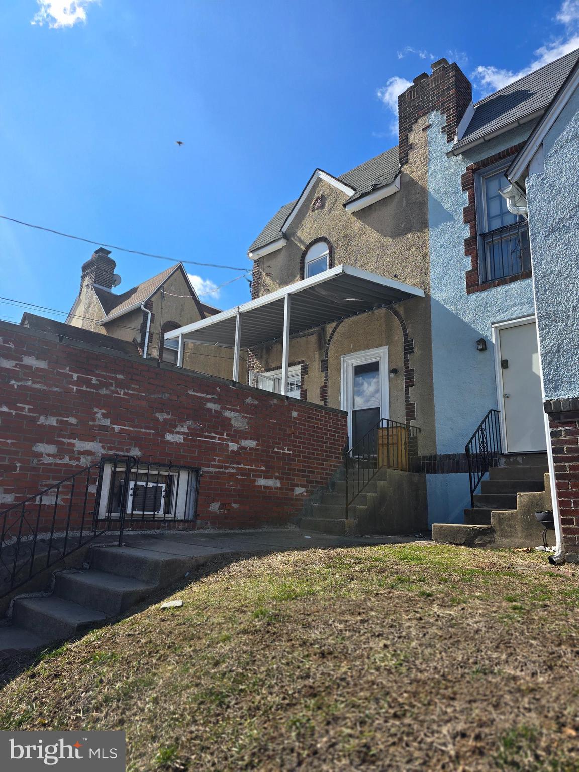 210 Long Lane Upper Darby, PA 19082 - Photo 4 of 21 a front view of a house with a yard