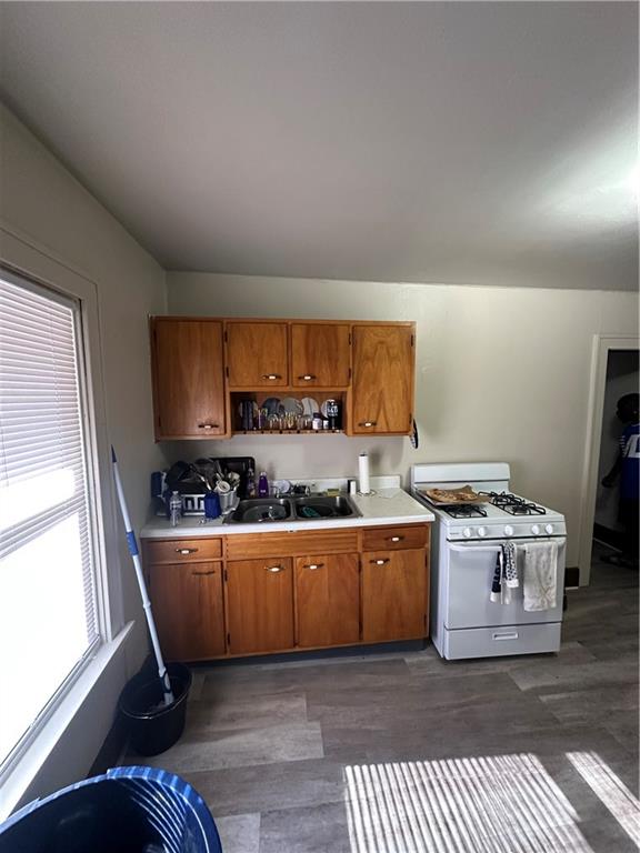 500 Woodward Avenue McKees Rocks, PA 15136 - Photo 11 of 34 a kitchen with stainless steel appliances a stove a sink and a refrigerator
