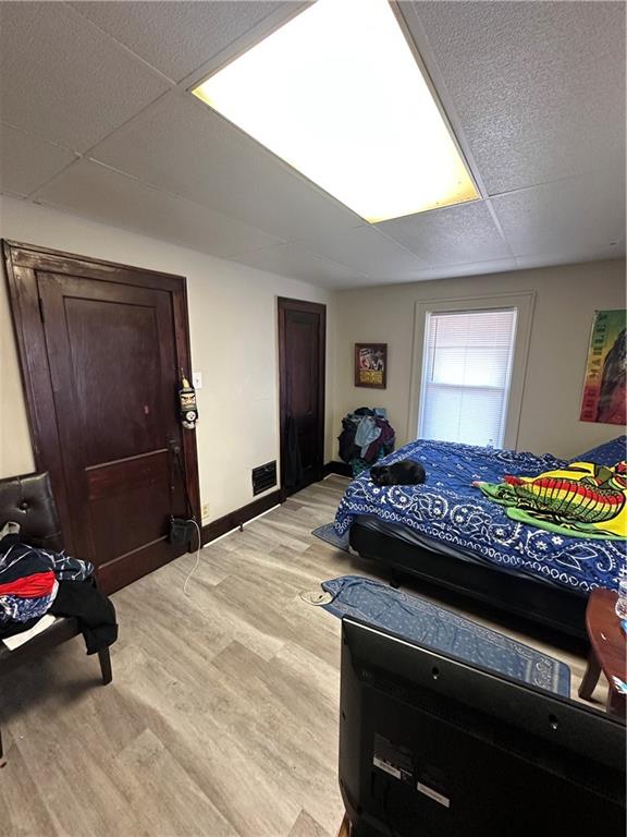 500 Woodward Avenue McKees Rocks, PA 15136 - Photo 12 of 34 a bedroom with a bed and a dresser