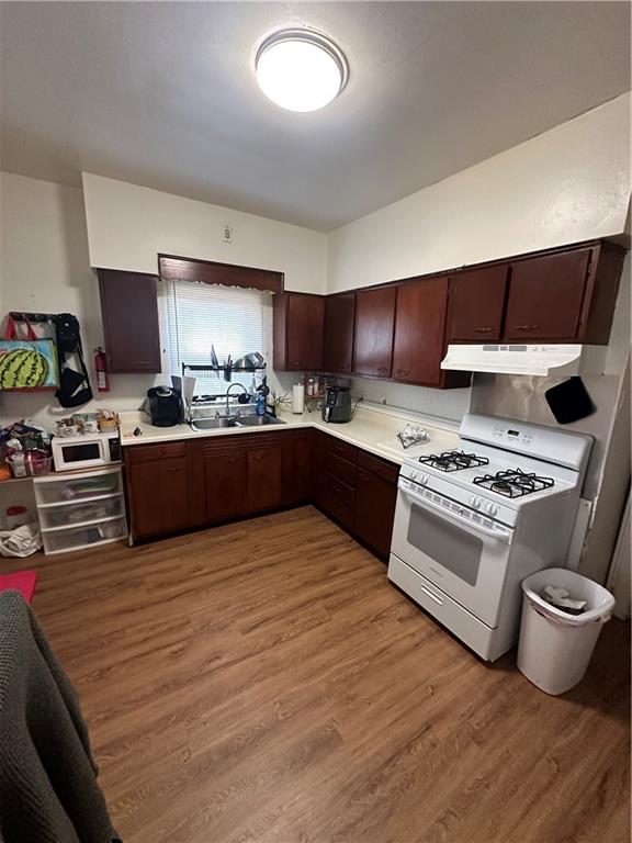 500 Woodward Avenue McKees Rocks, PA 15136 - Photo 17 of 34 a kitchen with stainless steel appliances granite countertop a sink and a stove