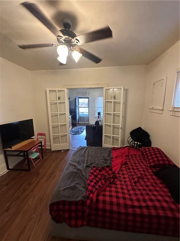 500 Woodward Avenue McKees Rocks, PA 15136 - Photo 22 of 34 a bedroom with a bed and wooden floor