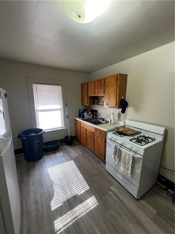 500 Woodward Avenue McKees Rocks, PA 15136 - Photo 3 of 34 a kitchen with a stove a sink and a window