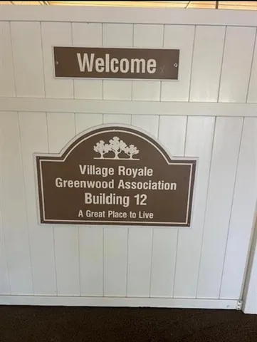 a view of a chairs and table in the patio