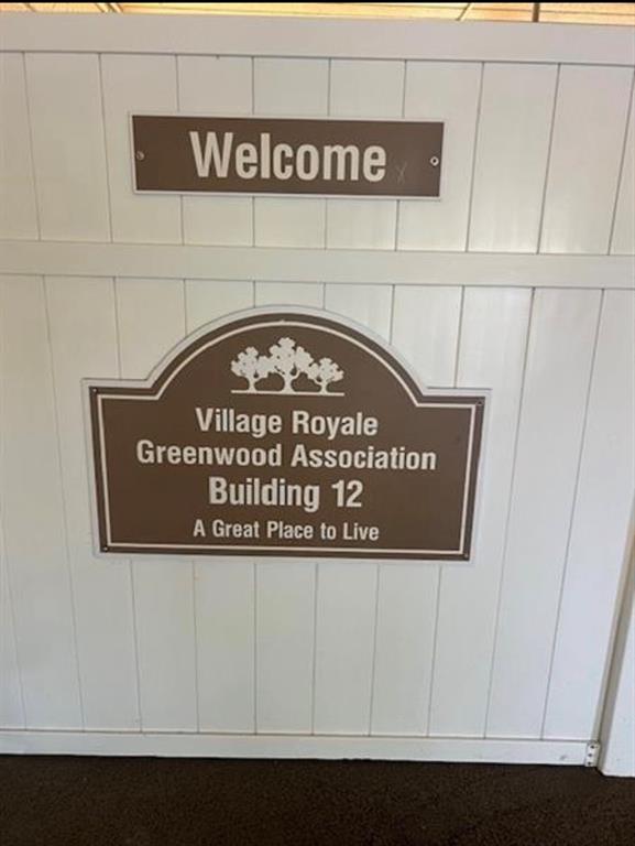 2615 Northeast 3rd Street, Unit 217 Boynton Beach, FL 33435 - Photo 20 of 55 a close up of a street sign