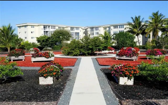 a view of swimming pool with outdoor seating