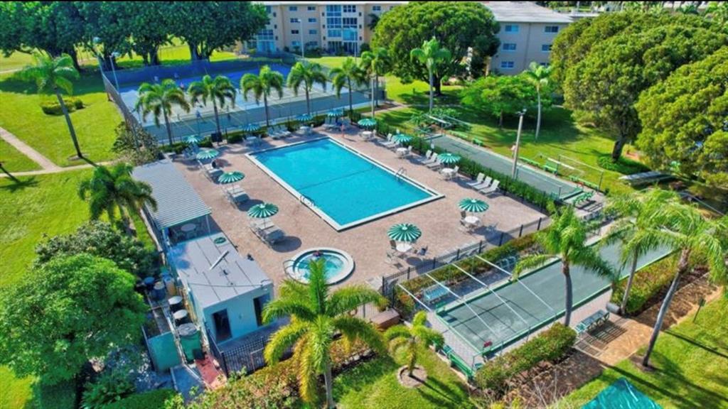 2615 Northeast 3rd Street, Unit 217 Boynton Beach, FL 33435 - Photo 34 of 55 aerial view of a house with yard swimming pool and outdoor seating