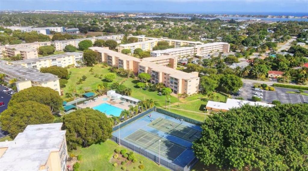 2615 Northeast 3rd Street, Unit 217 Boynton Beach, FL 33435 - Photo 53 of 55 an aerial view of residential houses with outdoor space and river