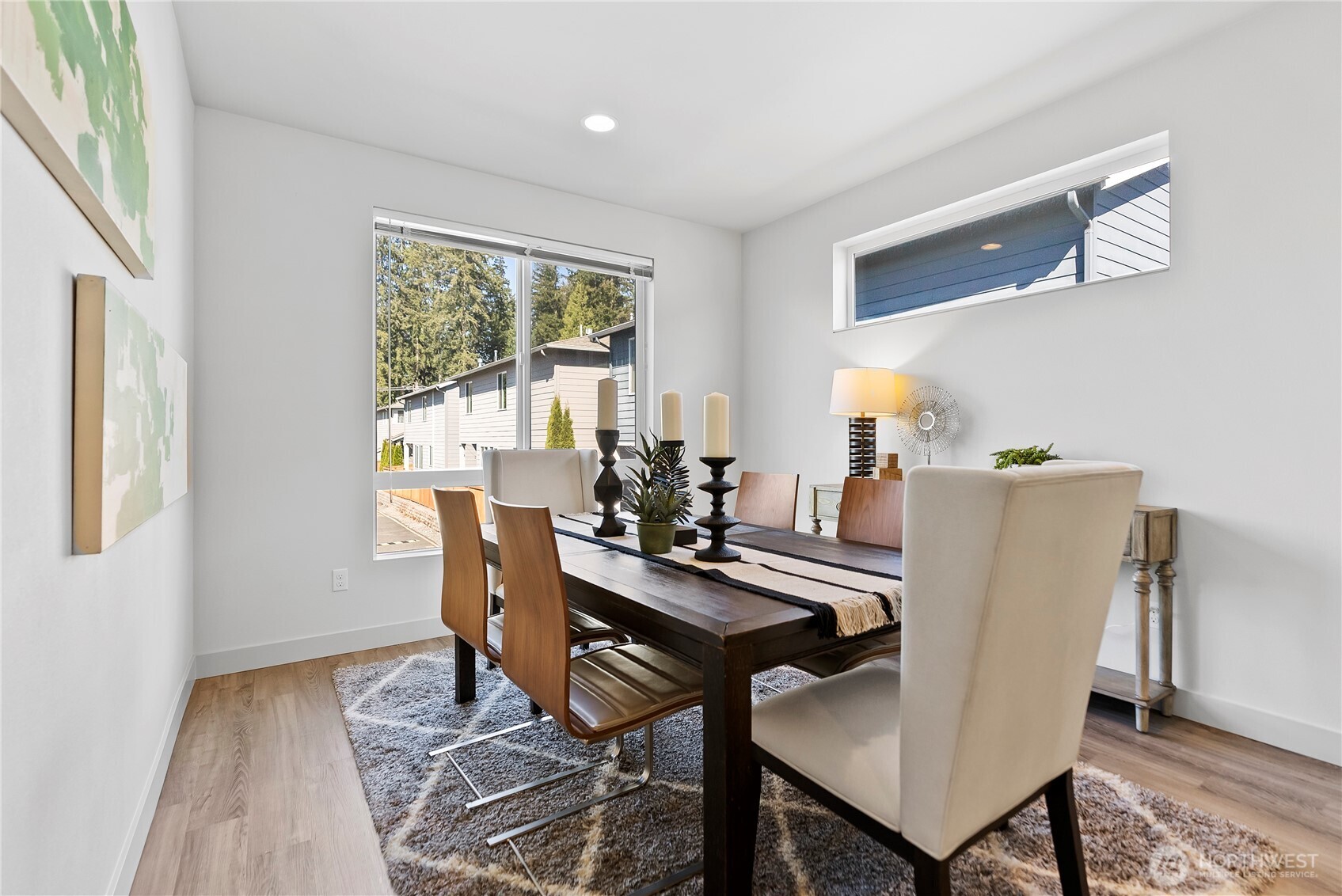 17905 35th Avenue Southeast, Unit A1 Bothell, WA 98012 - Photo 15 of 36 a view of a dining room with furniture window and outside view