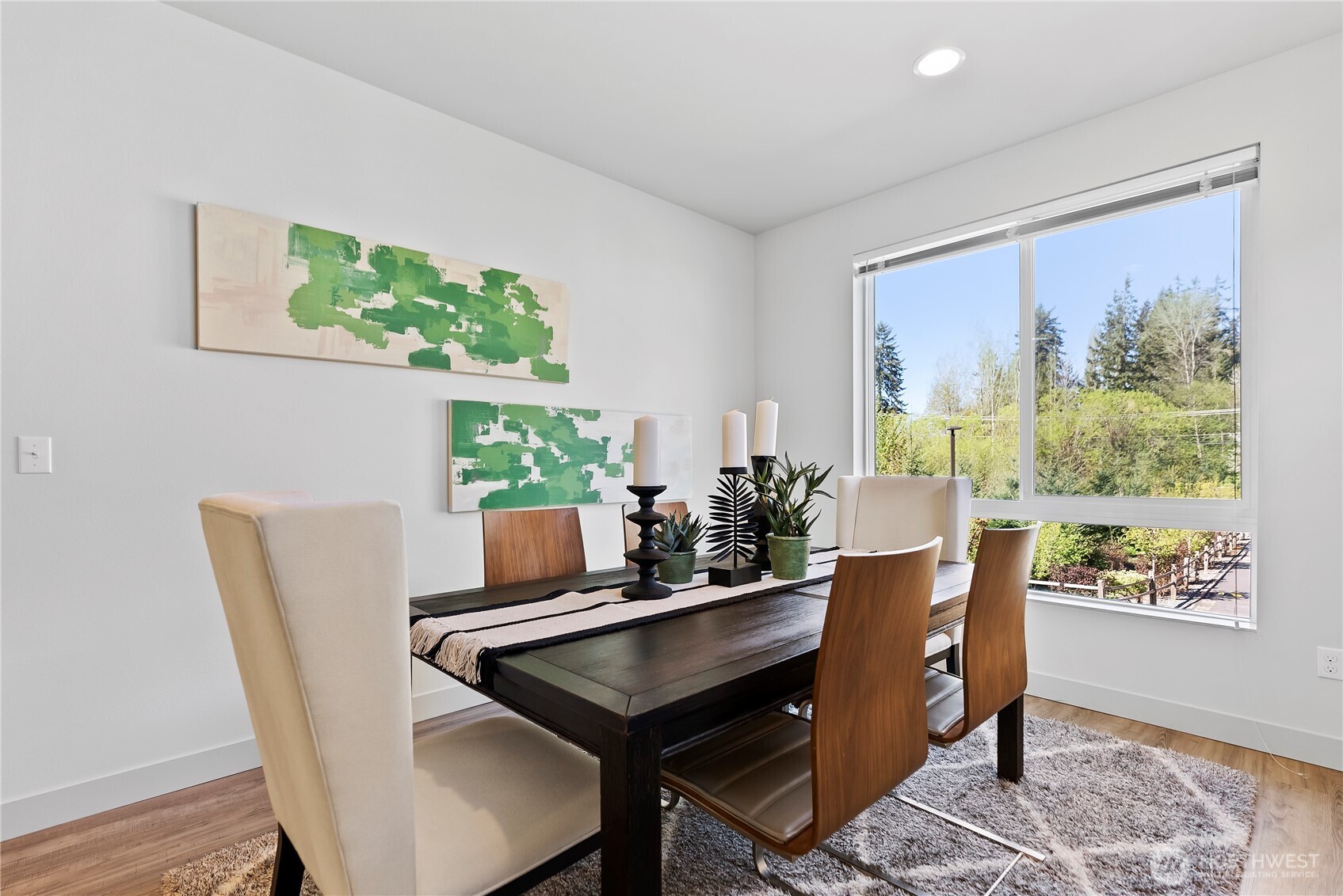 17905 35th Avenue Southeast, Unit A1 Bothell, WA 98012 - Photo 16 of 36 a view of a dining room with furniture window and wooden floor