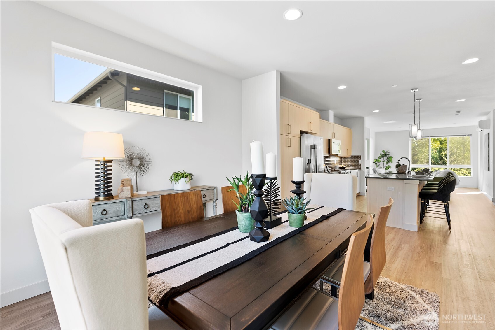 17905 35th Avenue Southeast, Unit A1 Bothell, WA 98012 - Photo 19 of 36 a living room with furniture and kitchen view