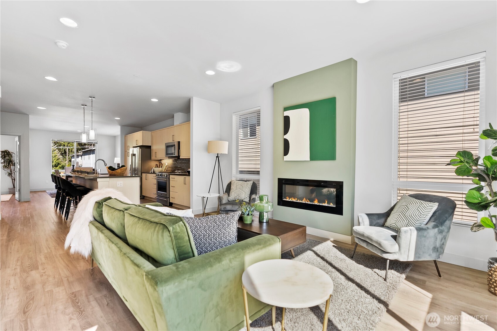 17905 35th Avenue Southeast, Unit A1 Bothell, WA 98012 - Photo 21 of 36 a living room with furniture and a fireplace