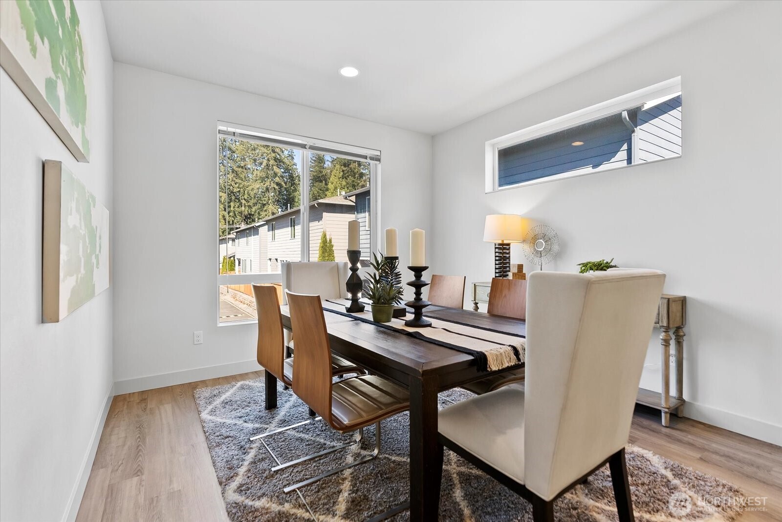 17905 35th Avenue Southeast, Unit A1 Bothell, WA 98012 - Photo 22 of 36 a view of a dining room with furniture window and outside view