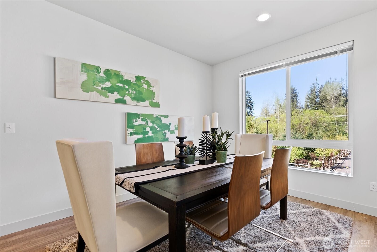 17905 35th Avenue Southeast, Unit A1 Bothell, WA 98012 - Photo 24 of 36 a view of a dining room with furniture window and wooden floor