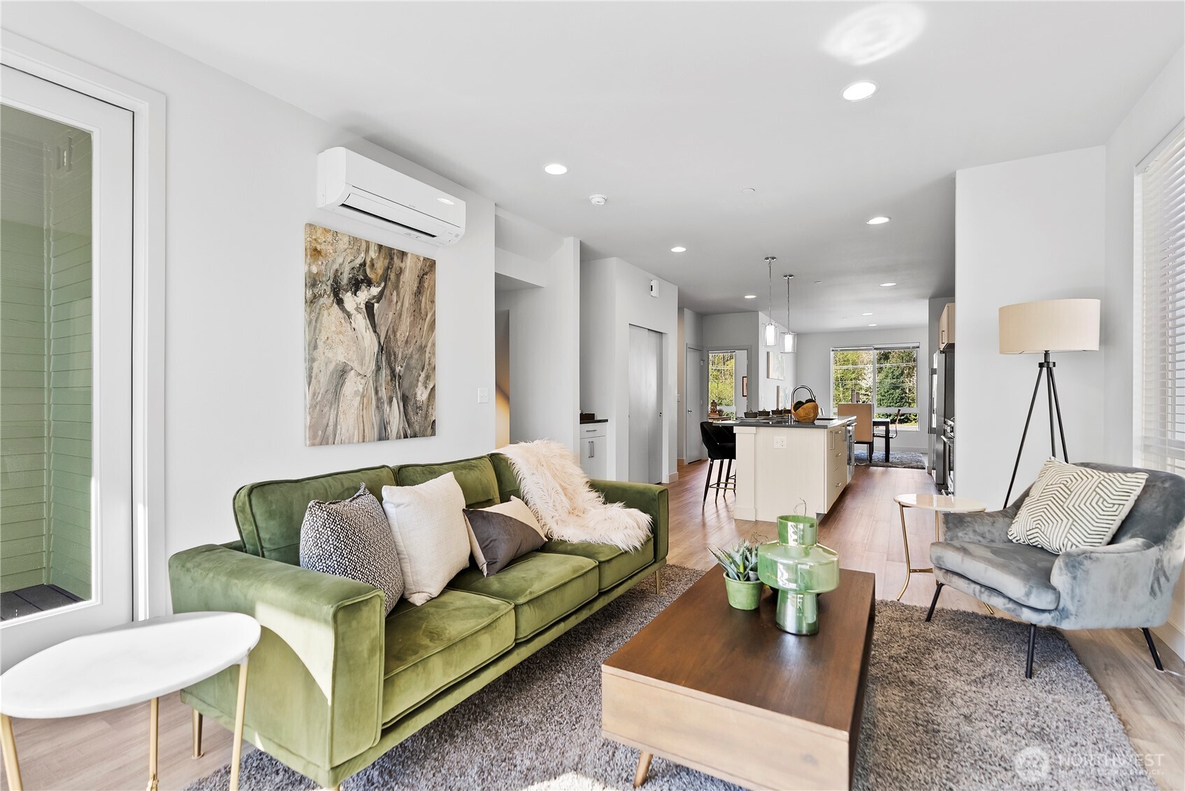 17905 35th Avenue Southeast, Unit A1 Bothell, WA 98012 - Photo 25 of 36 a living room with furniture and a wooden floor