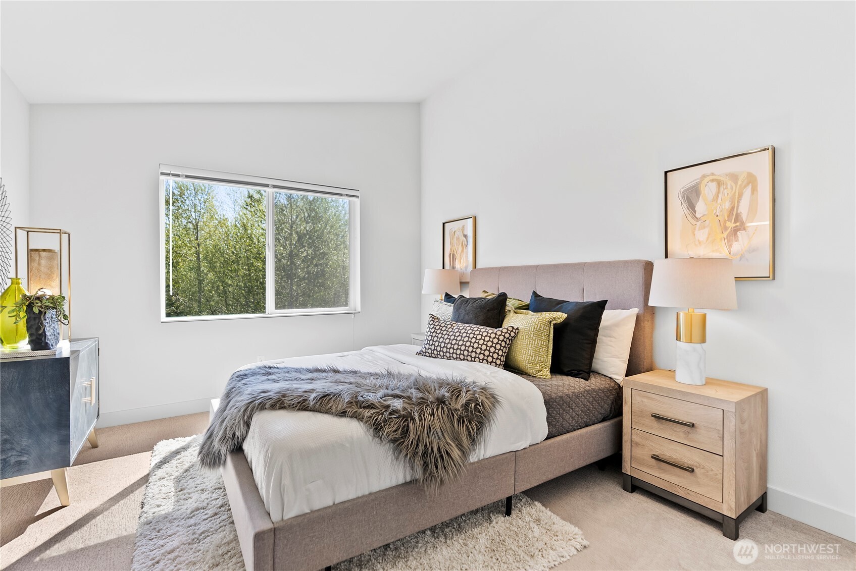 17905 35th Avenue Southeast, Unit A1 Bothell, WA 98012 - Photo 28 of 36 a bedroom with a bed and a window