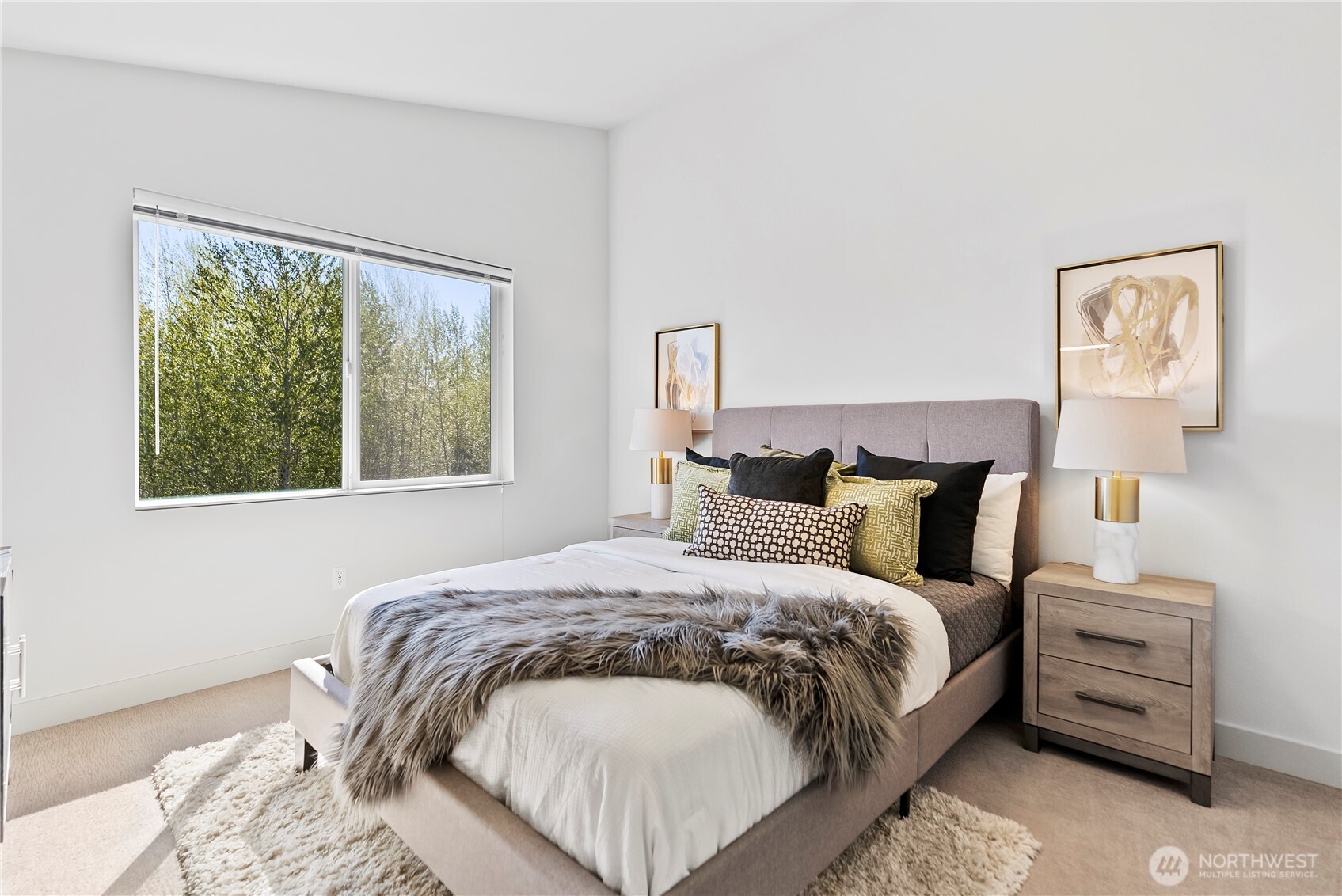 17905 35th Avenue Southeast, Unit A1 Bothell, WA 98012 - Photo 29 of 36 a bedroom with a bed and a window